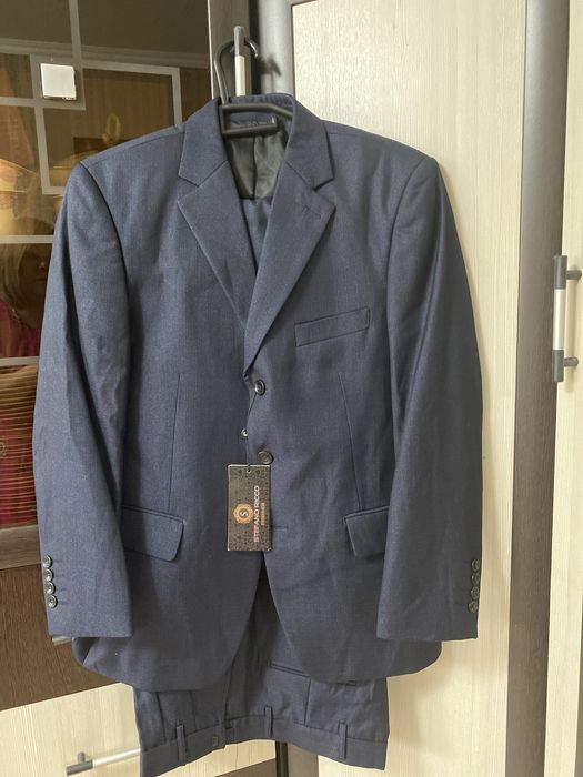 Продам новый костюм на коржын