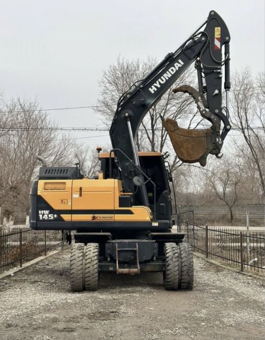 Услуги экскаватор калесный ГИДРОМОЛОТ