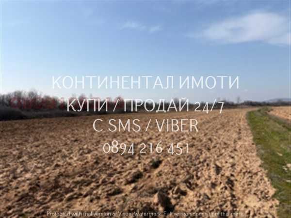 Код 70097. Земеделска земя - оризище 11500м2, кат. 5, сега ползвана като нива на около 500м от АМ Тракия