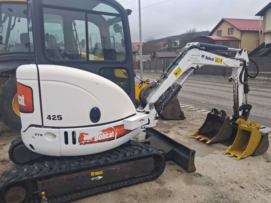 Vând miniexcavato bobcat 425