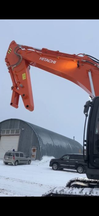 Экскаватор с вибропогружателем