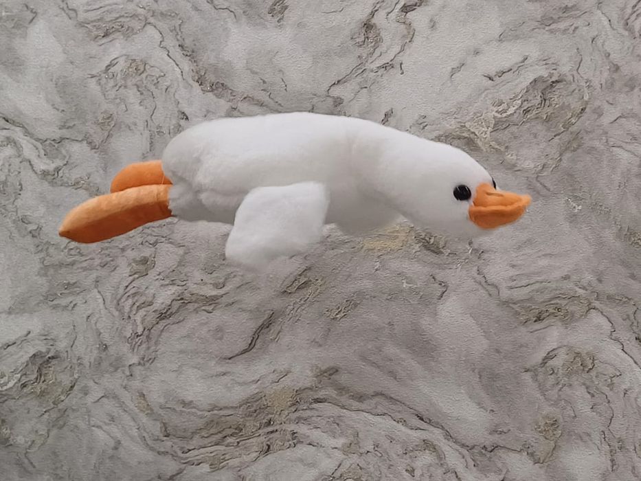 Мягкие игрушки гуси