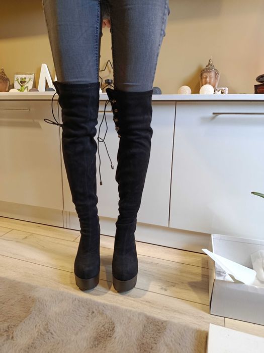 Нови високи чизми.