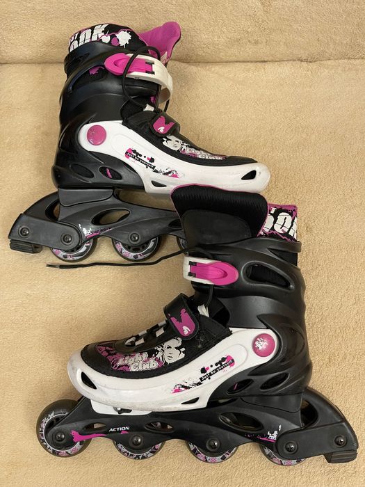 Роликовые коньки