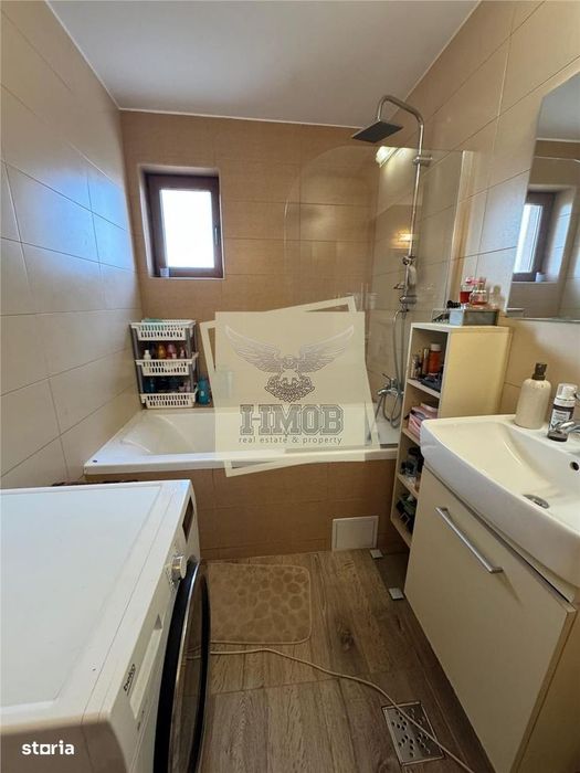 Apartament  decomandat cu 3 camere 2 bai de 105 mp utili