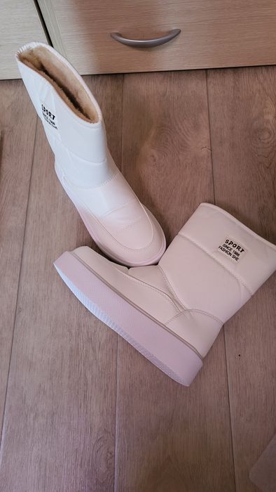 Продам новые сапоги