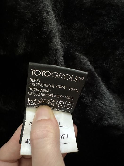 Женское кожаное пальто с натуральным мехом