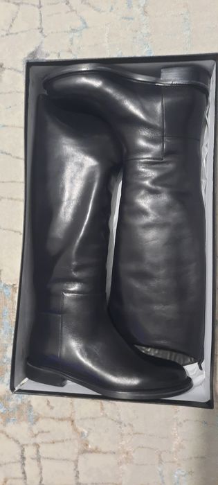 Продам новые зимние сапоги