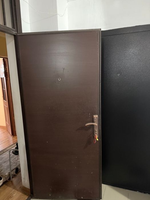 Сырткы темір есік