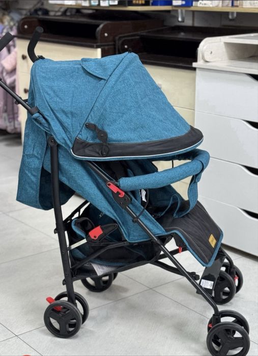 Коляска бирюзового цвета