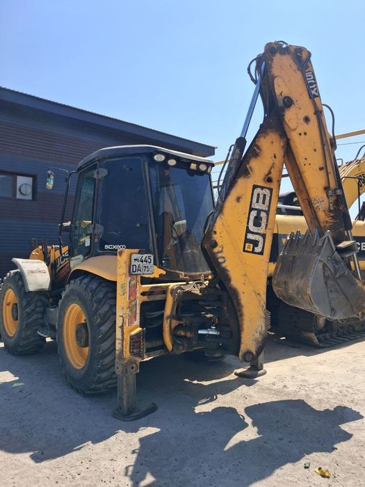 JCB 5cx Sotiladi holati yaxshi yili 2014