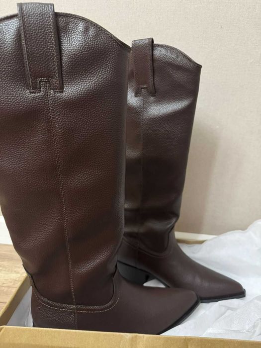 Продаю новые сапоги