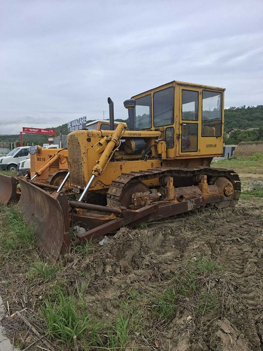 3 Buldozere Fiat si Caterpillar