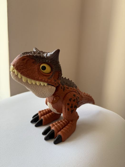 Динозавр игрушка