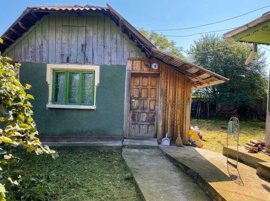 Casă cu teren de 4.500 mp în Blăgești, Jud. Bacău