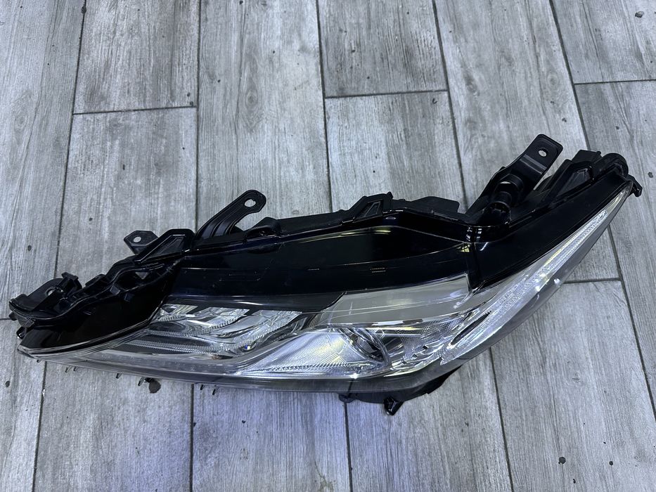 Фара Камри 75 левый