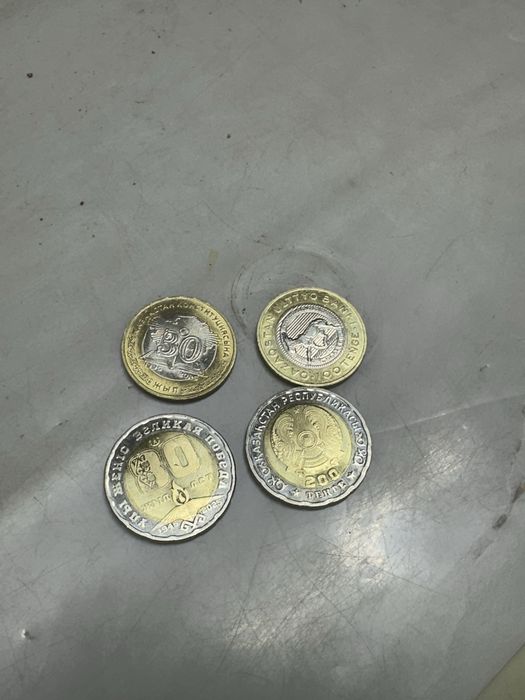 Продам монеты -200тг