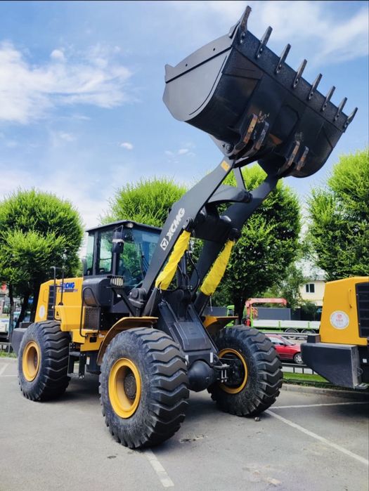 Продам Погрузчик Экскаватор 3в 1