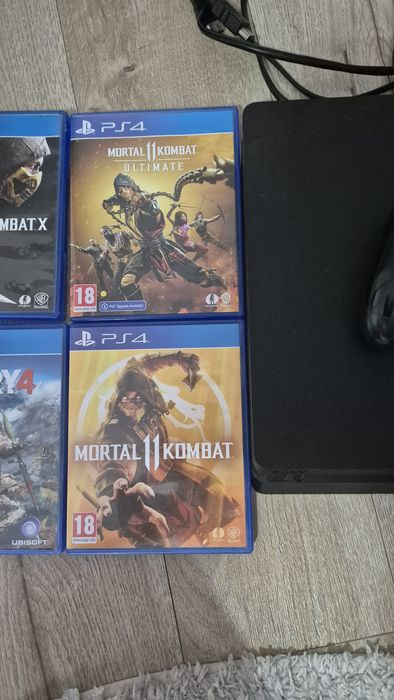Playstation4 cu 6 jocuri incluse si o maneta