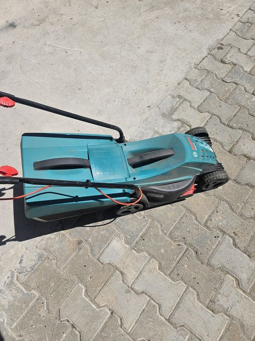Газонокасилка продам