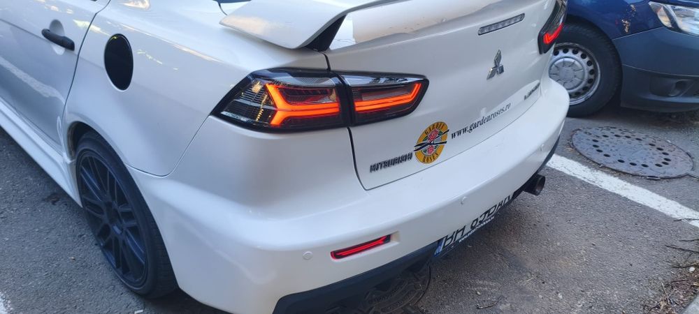 Mitsubishi Lancer X – EVO Style – 1.6 Benzină, 2011 – Alb/Negru – O bi