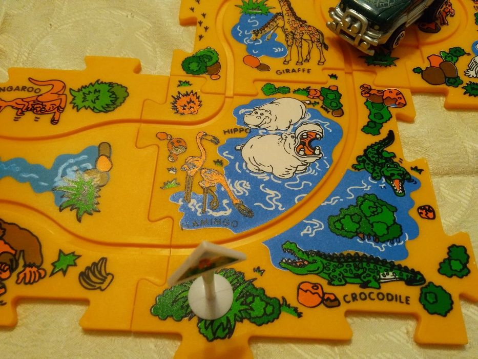 Joc educativ-puzzle, SAFARI PRIN JUNGLA, masinuta pe baterii