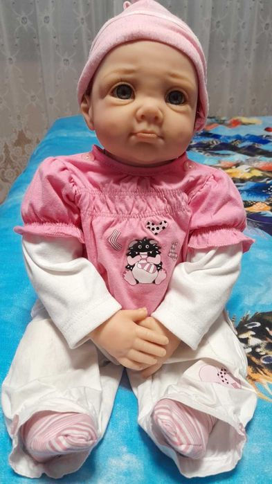 păpușa de colectie                         ,