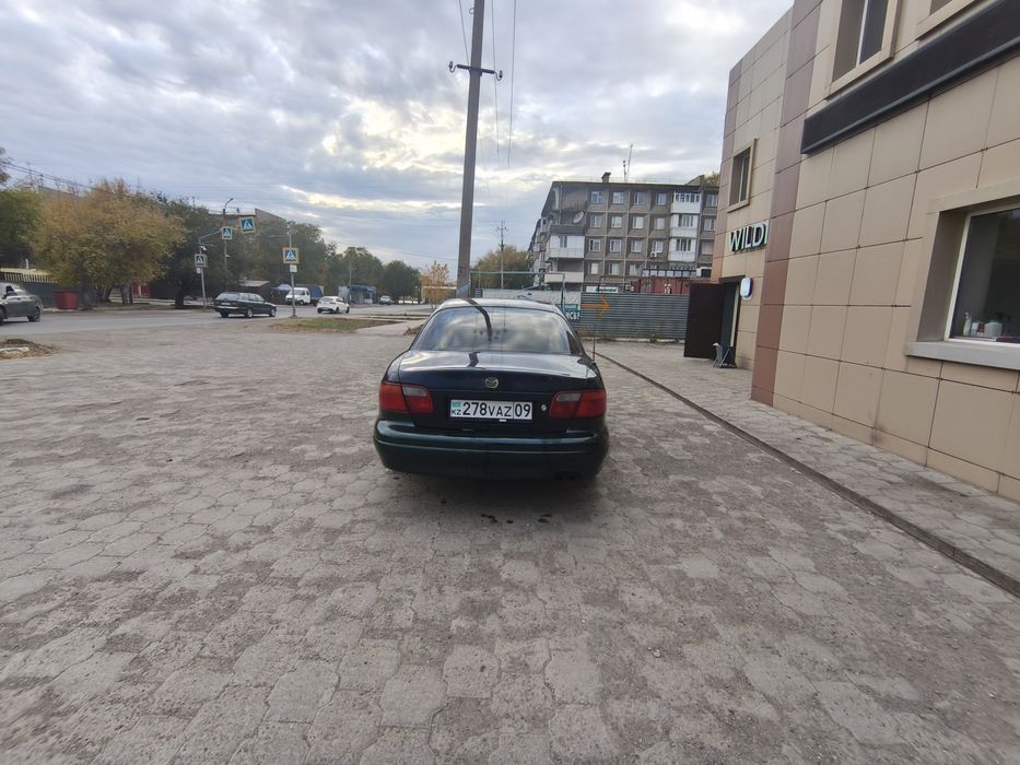 Продаю машину Мазда Кседокс 9