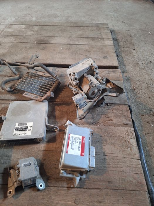 Запчасти на тойота карина е.