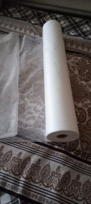 Одноразовые простыни в рулоне