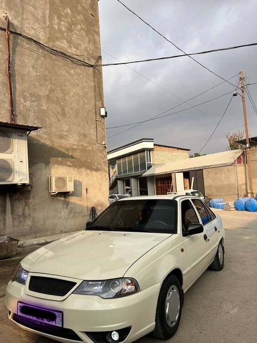 Nexia 2  qaymoq rangli