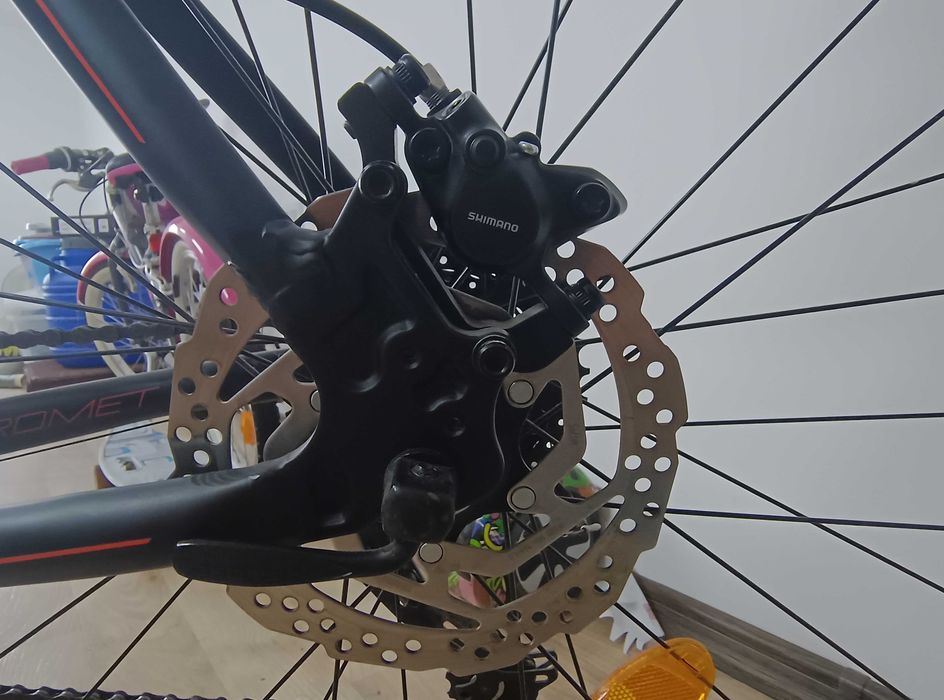 Bicicleta trekking Romet Orkan 4 M L/21 - Culori negru/rosu - Stare foarte buna