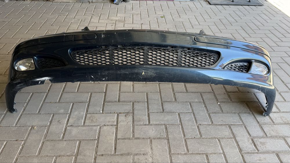 Передний бампер Mercedes W211