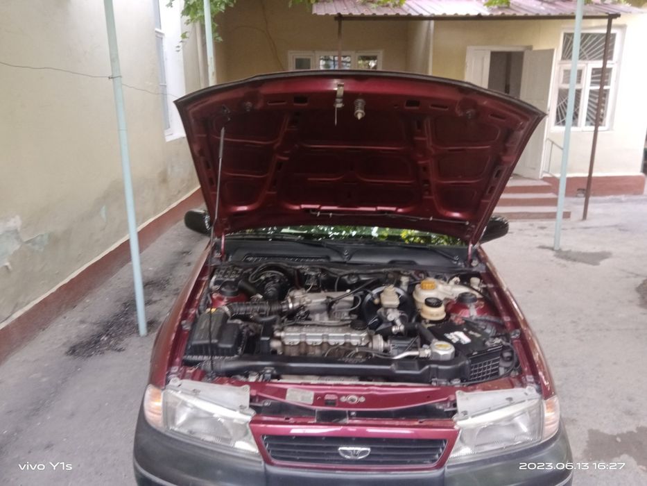 Автомобиль NEXIA1 DAEWOO