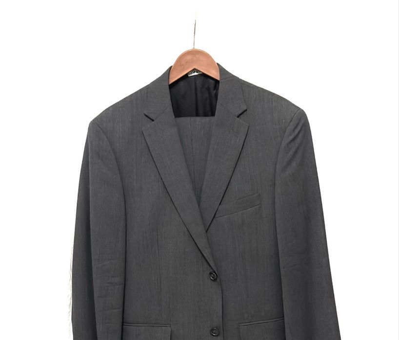 Мужской костюм темно серый. Размер 50/6.