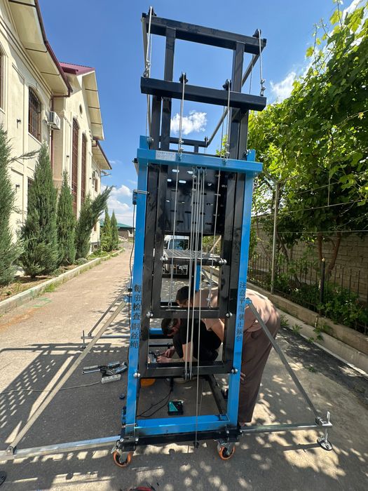 Elektironi lesa lift eskalator