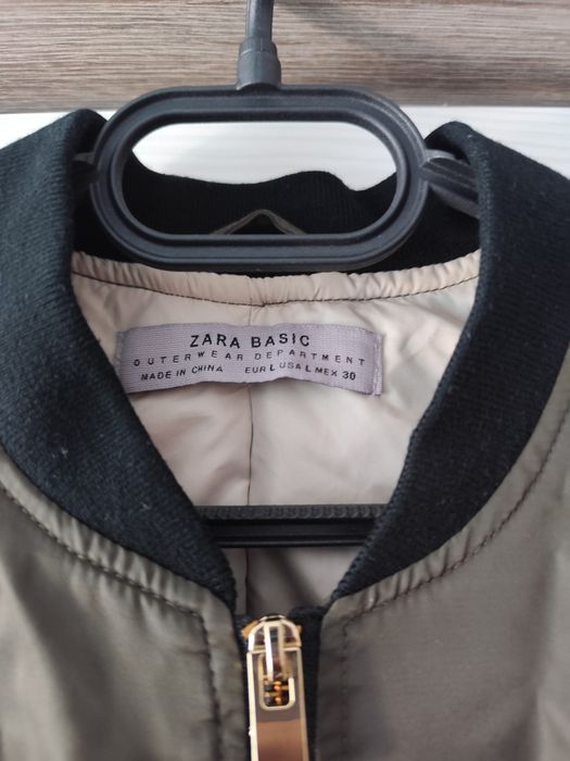 Преходно тъмно зелено дамско яке