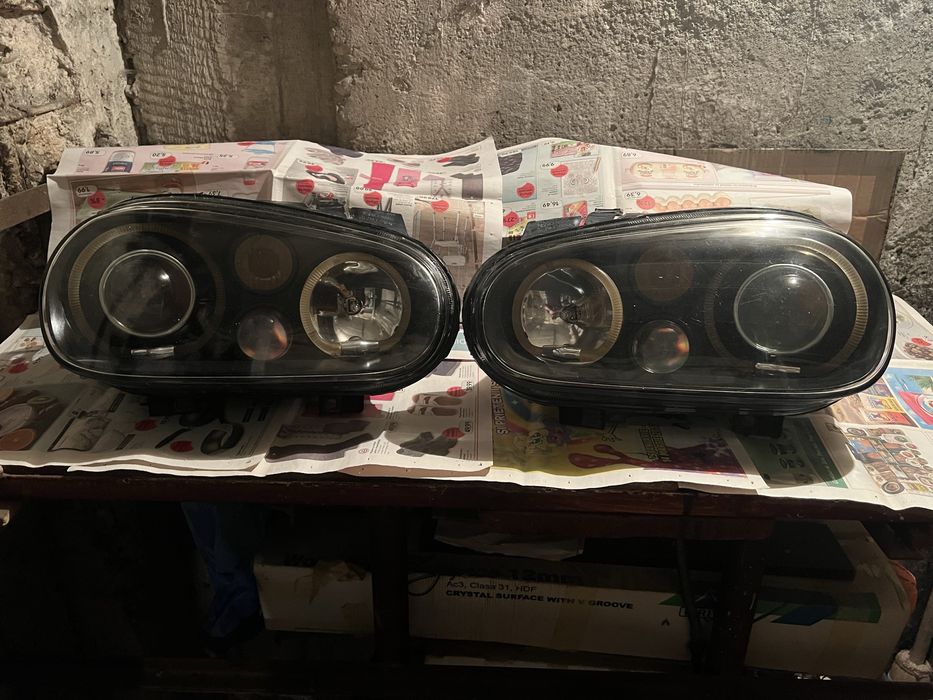 Faruri Volkswagen Golf 4 Hella cu lupă + faruri modificate