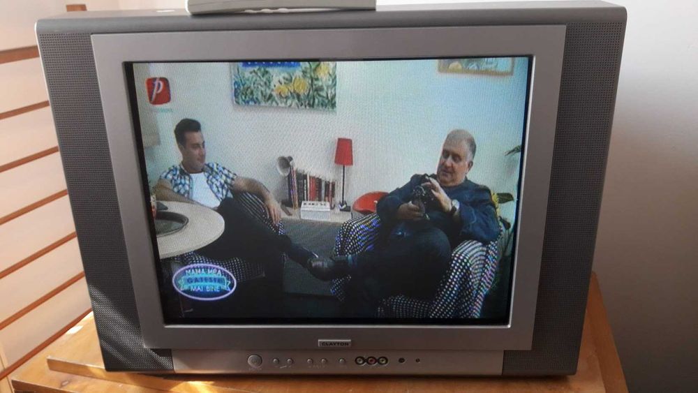 Televizor COLOR Clayton cu tub, are Teletext , diagonala 54 cm .