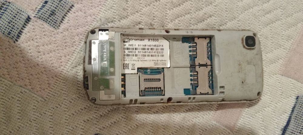 micromax x1800 кнопочный телефон.