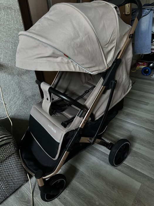 Продам детскую коляску Luxmom