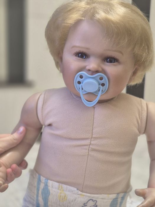 Реалистичная кукла