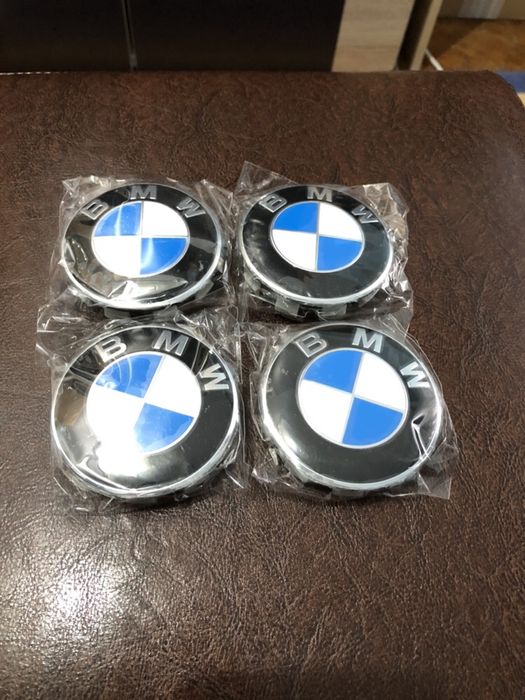 Set 4 capace roti, jante aliaj BMW Originale diametru 68 mm NOI