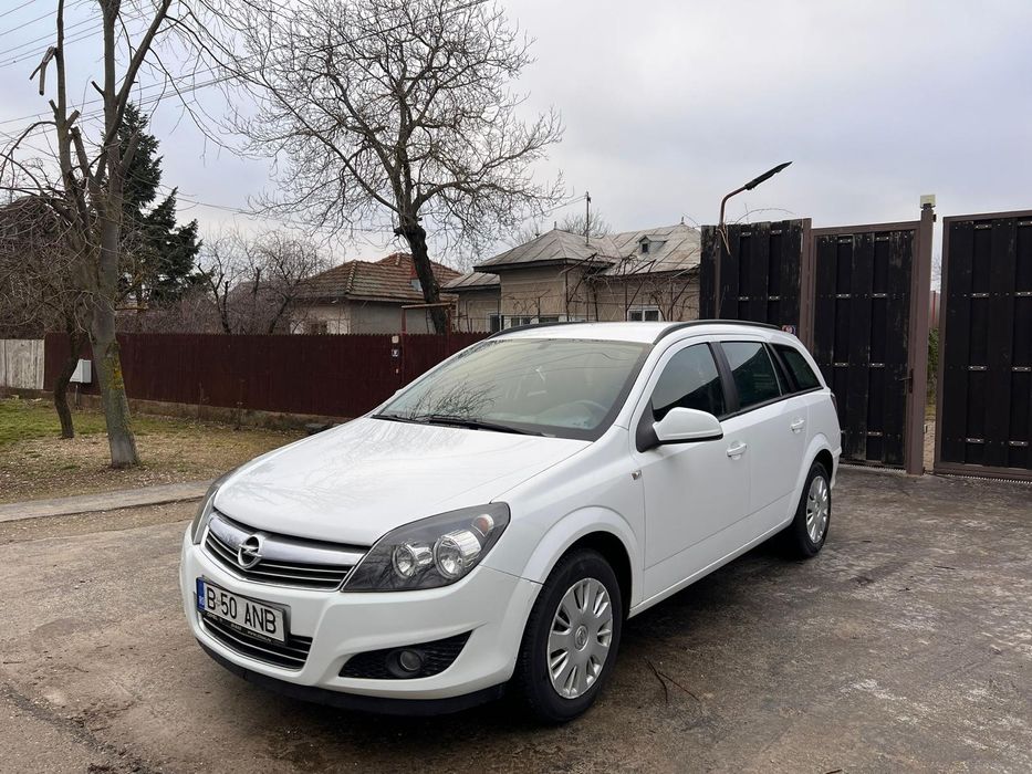 Opel astra h 2013 rulaj doar 100.000 real