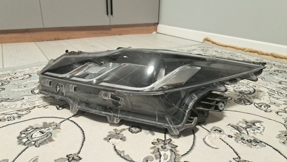 Toyota Corolla фара e210