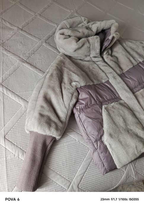 Продам пуховик новый