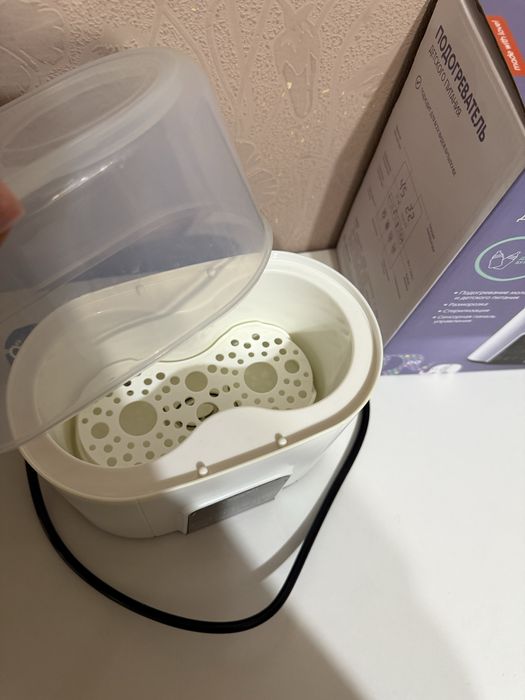 Подогреватель стерилизатор и молокоотсос