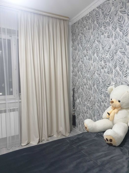 Бежевого цвета шторы