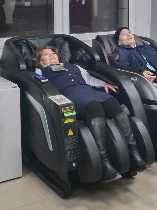 Массажный кресло