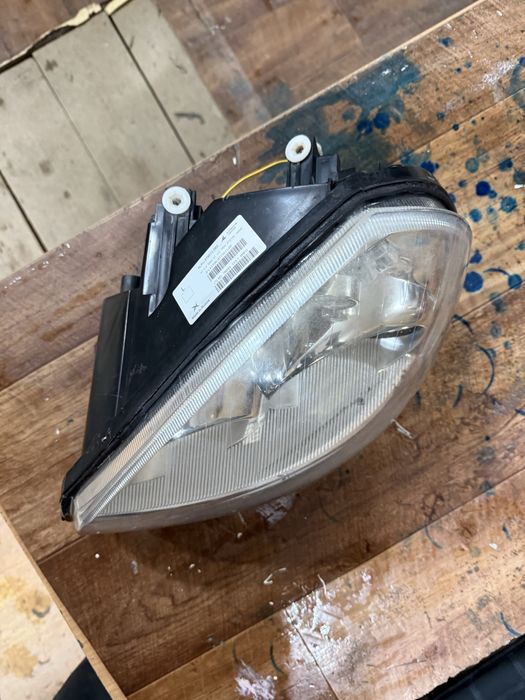 Фара приора 1 левая оригинал бош